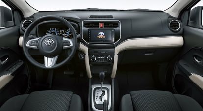 Toyota Rush with a clean and comfortable interior, ensuring a pleasant driving experience, available for car rental in Palawan, Philippines.