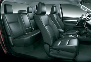 Toyota Hi-Lux, a 5-seater pickup truck similar to many others commonly seen in the Philippines, available for self-drive car rental.