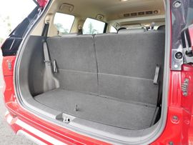 Toyota Innova with a spacious trunk, perfect for road trips, available for car rental in Palawan.