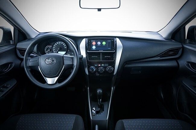 Toyota Vios with a new interior, available for self-drive rental in Palawan, offered by a car rental service in Puerto Princesa, Philippines.