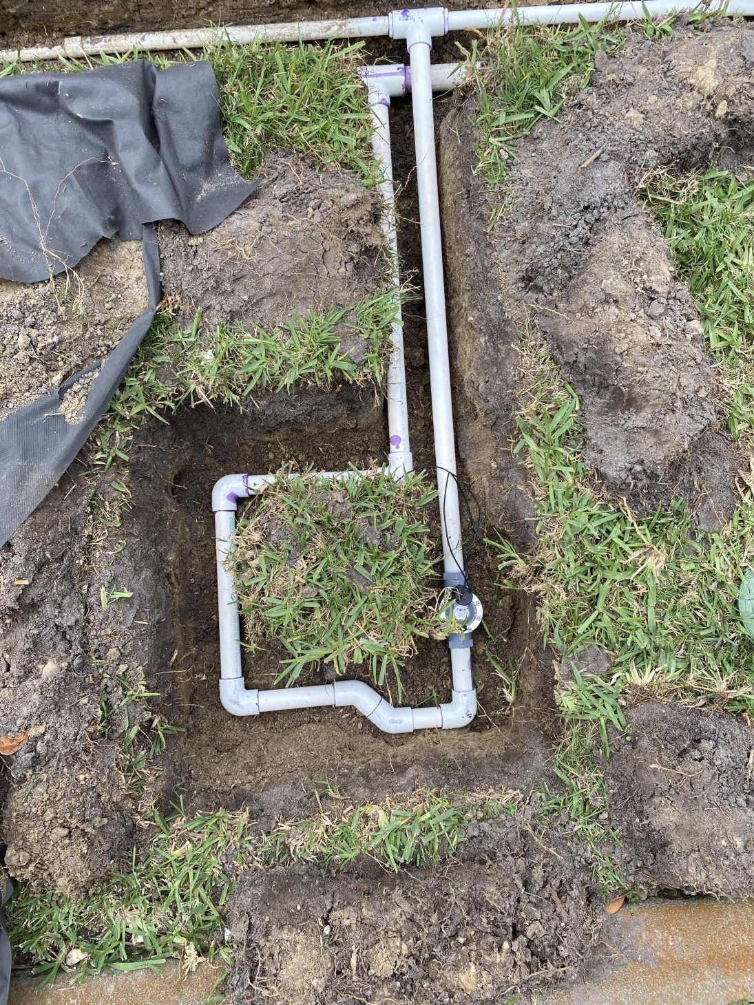 Covering Water Pipes with Soil