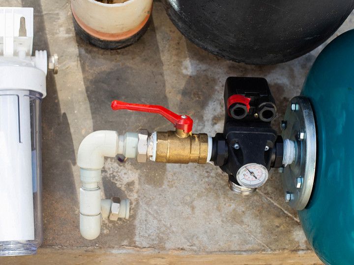 Water Pump with a Red Valve