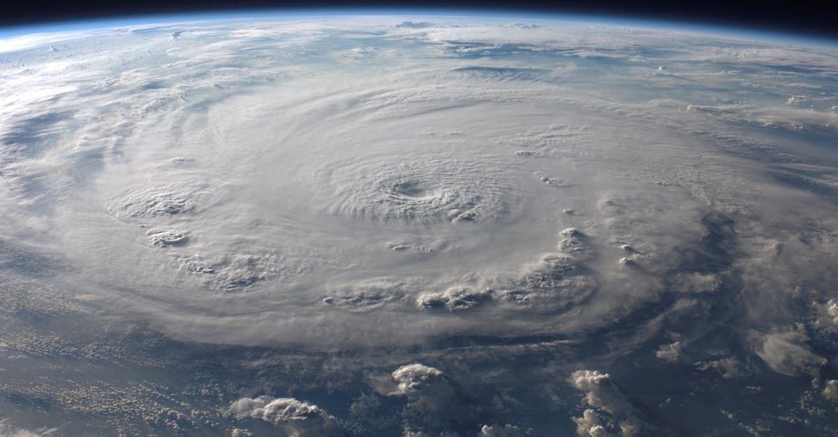 An aerial view of a hurricane in the ocean from space.