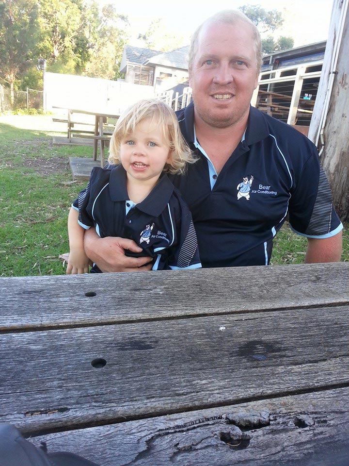 Photo of a Father and Daughter — Air Conditioning in Bateau Bay NSW