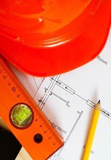 Engineer Helmet, Pencil, Ruler and Building Blueprint — Construction in Bentley Park, QLD
