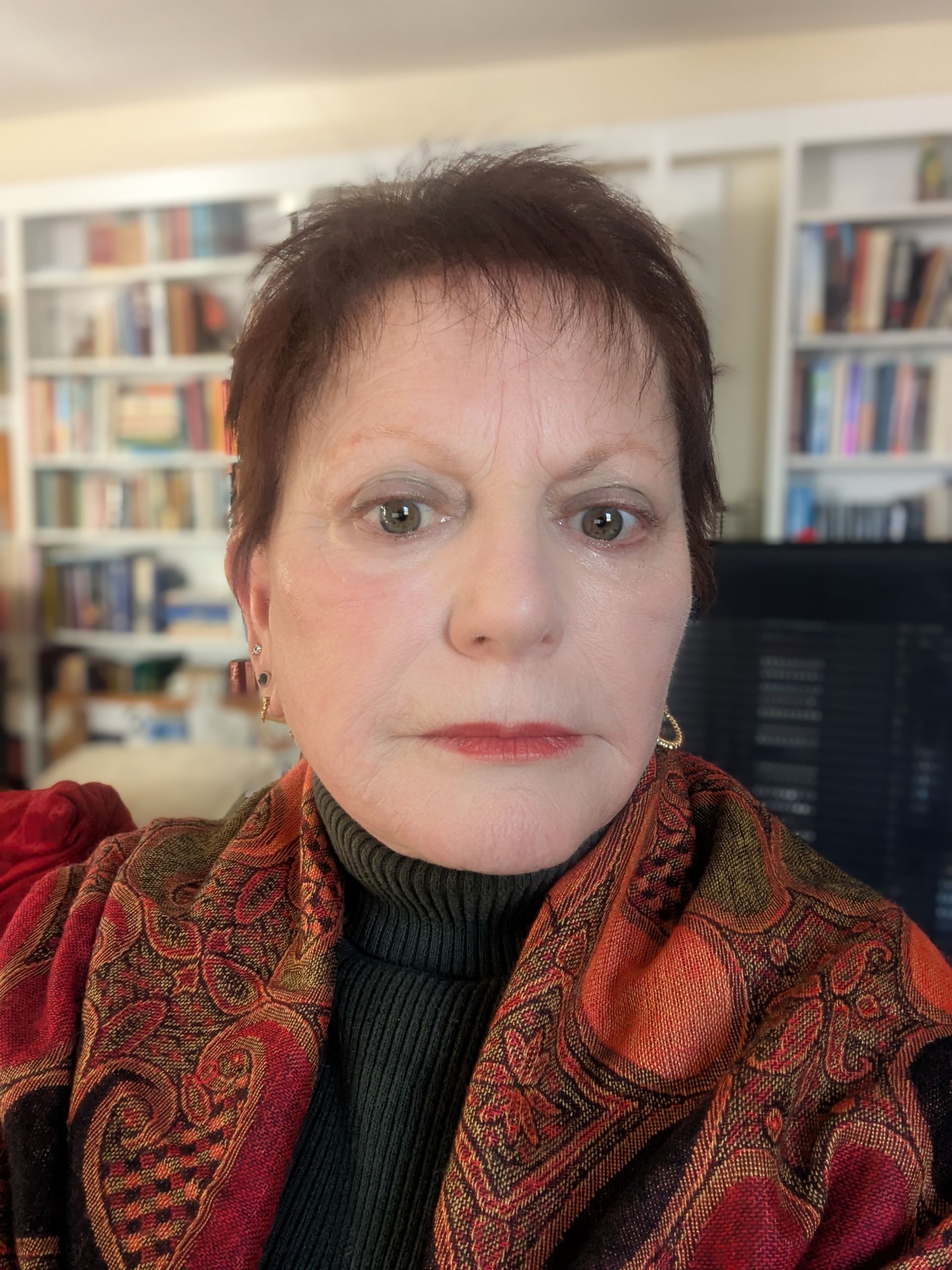 Hands clasped together for support. Person wearing a beige sweater touches another's hand. Hands clasped together for support. Person wearing a beige sweater touches another's hand.