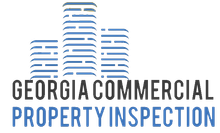 Georgia Property Inspection logo: Circular badge with a house inside a magnifying glass.