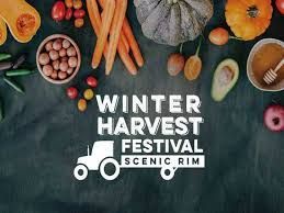 Winter Harvest Festival logo with produce laid out.