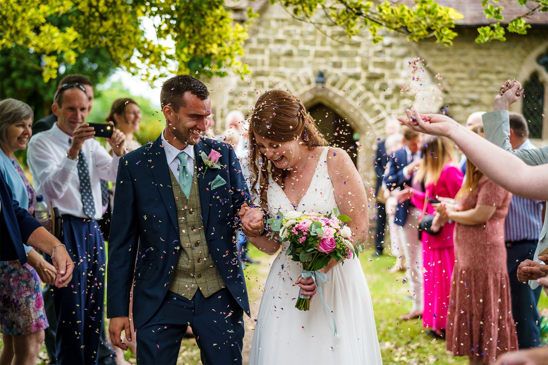 Bride & Groom with confetti