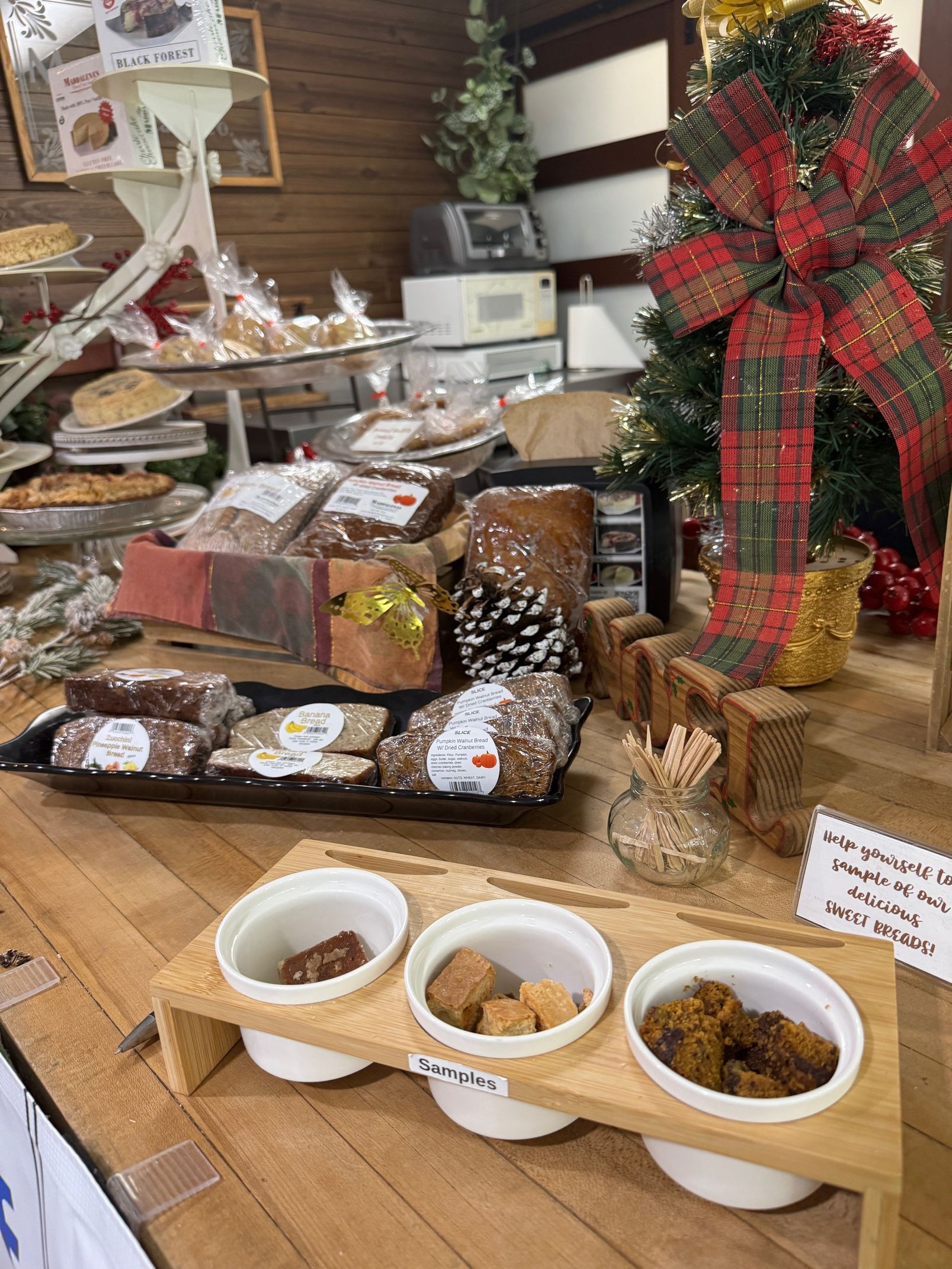 A cheesecake with strawberries and blueberries on top