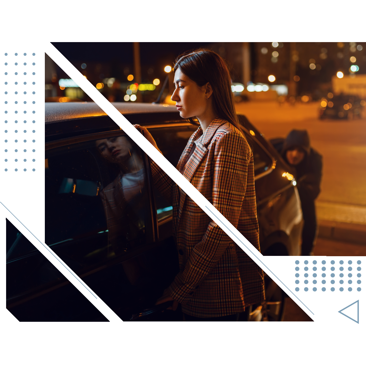 A woman is standing next to a car while a man tries to steal it.