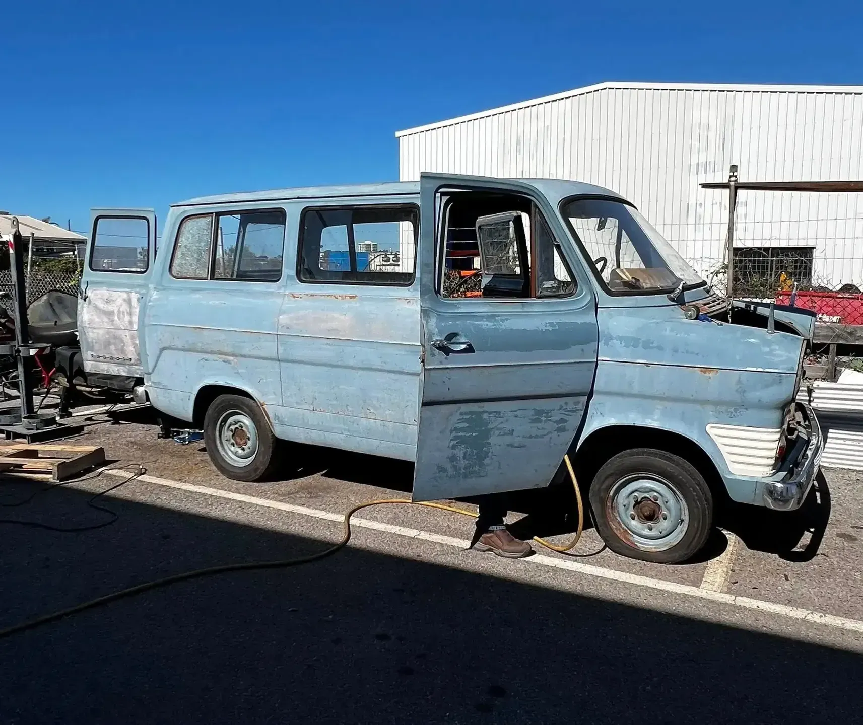 Blue Vintage Van With Open Doors — Gladstone Mufflers & Suspension In Gladstone Central, QLD