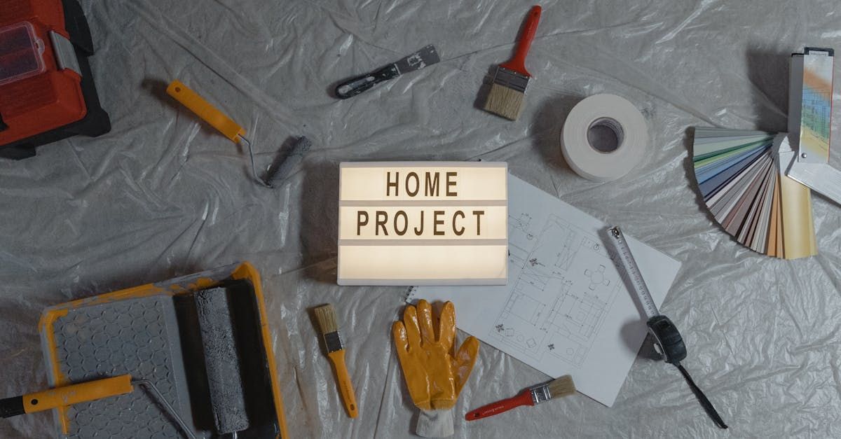 A sign that says `` home project '' is surrounded by construction tools.