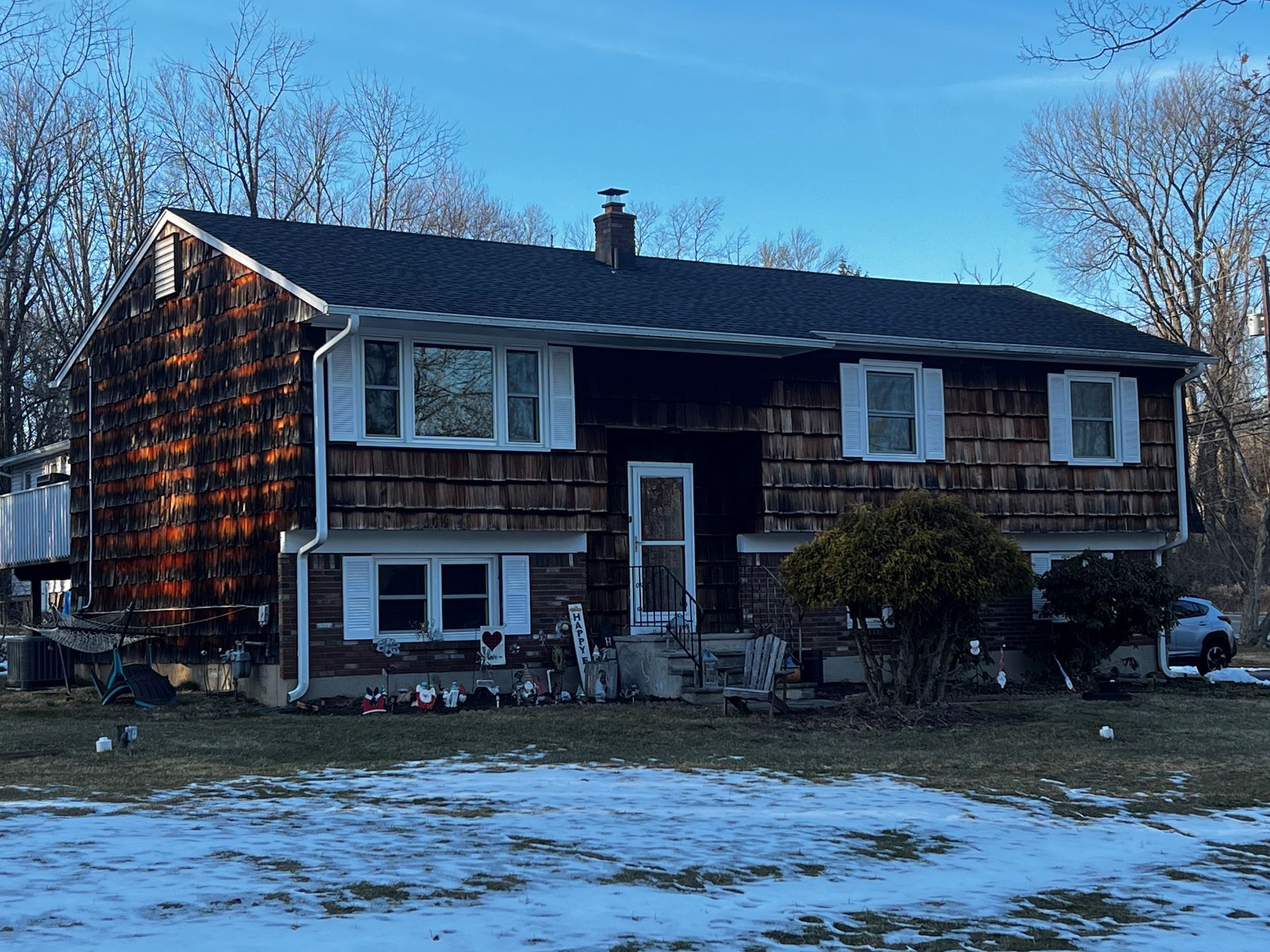 Large House With Black Roof — Flanders, NJ — Four J’s Contracting & Roofing LLC