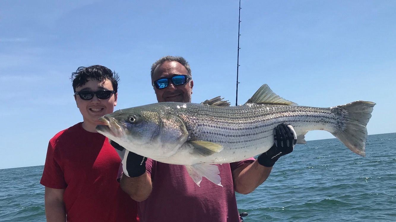 father and son caught a fish