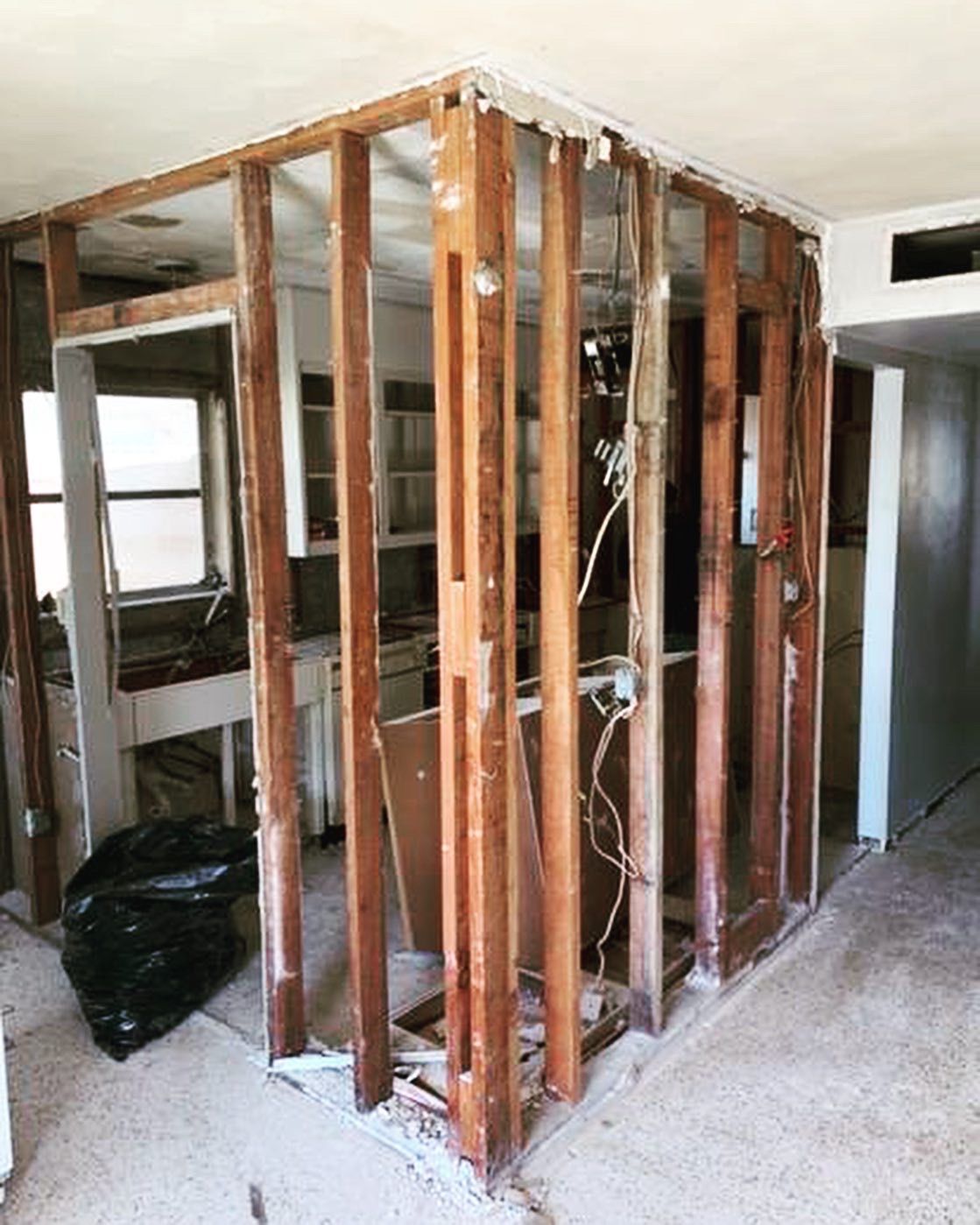 A room with a lot of wooden beams in it.