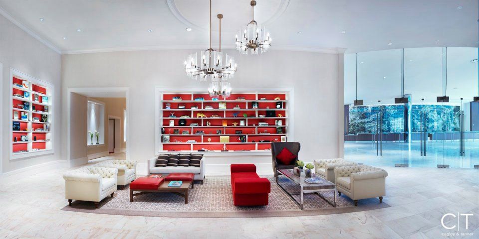 A living room filled with furniture and a bookshelf.
