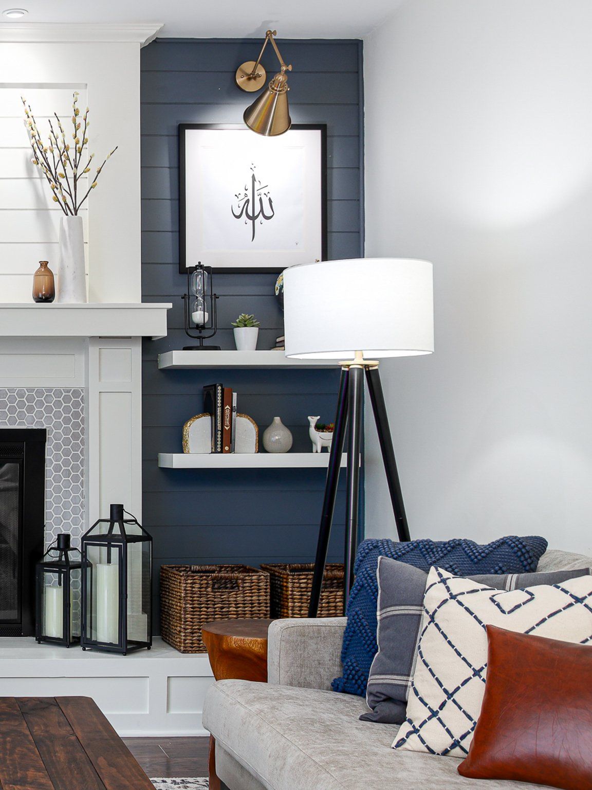 A living room with a fireplace and a couch