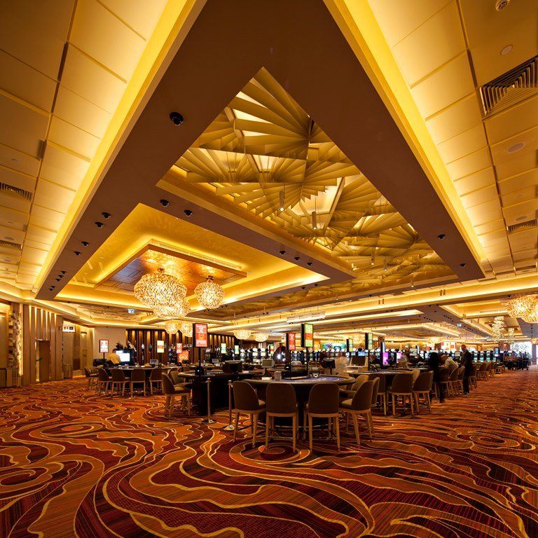 A large room with tables and chairs in it