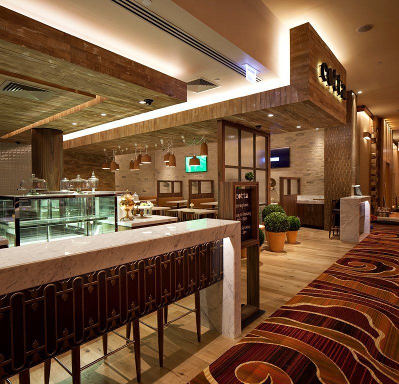 A restaurant with a sign that says ' grill ' on it