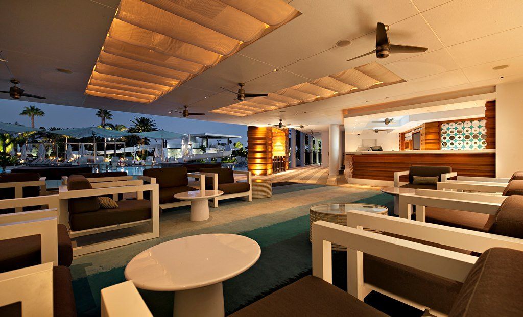 A living room with a lot of furniture and a table