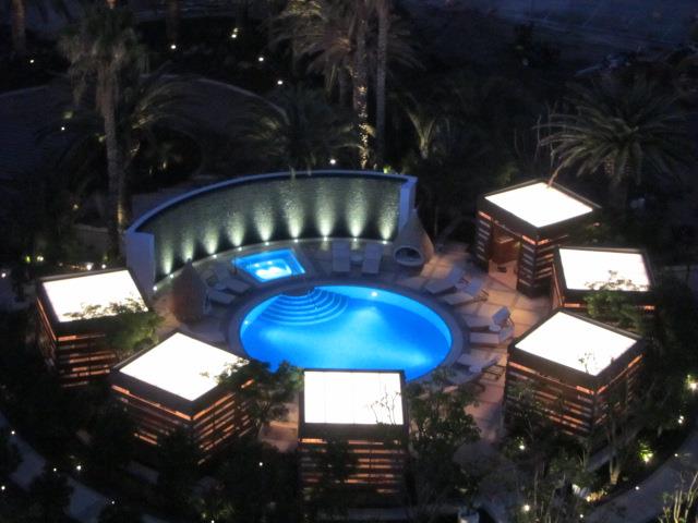 An aerial view of a swimming pool at night