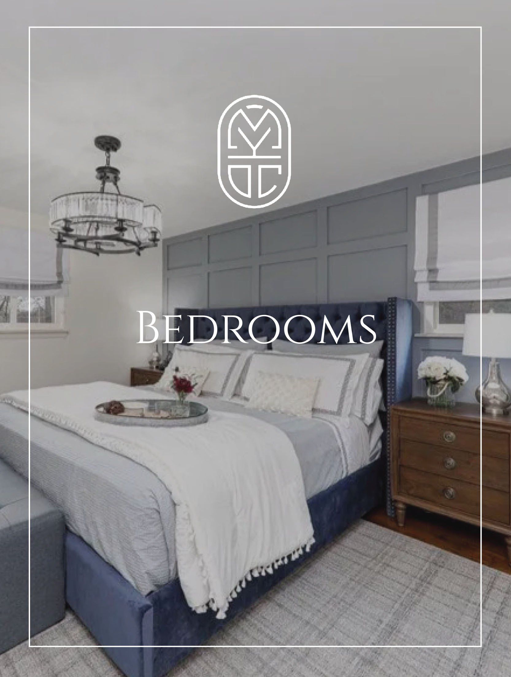 A bedroom with a bed , nightstand , and chandelier.