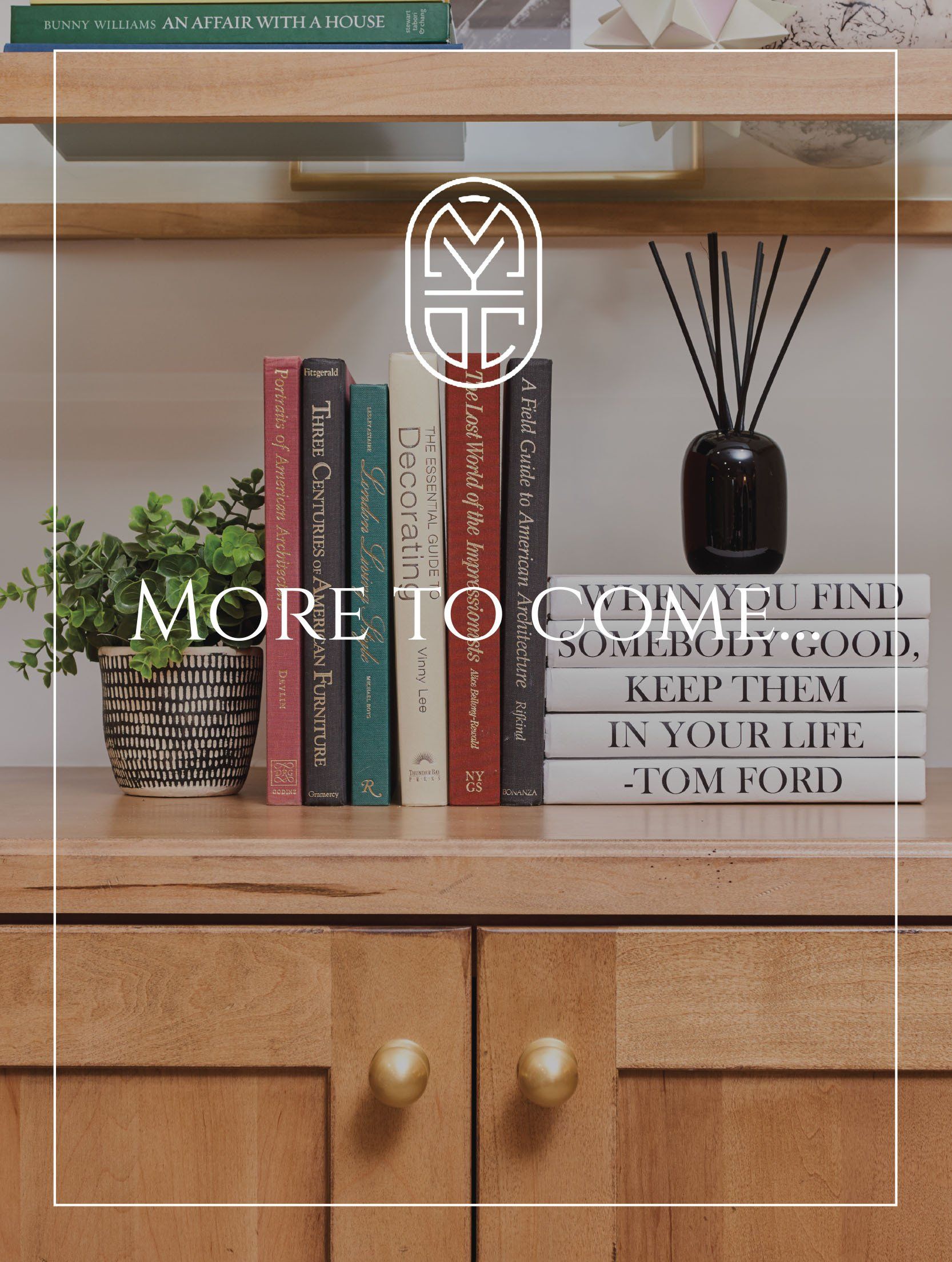 A stack of books sitting on top of a wooden shelf.