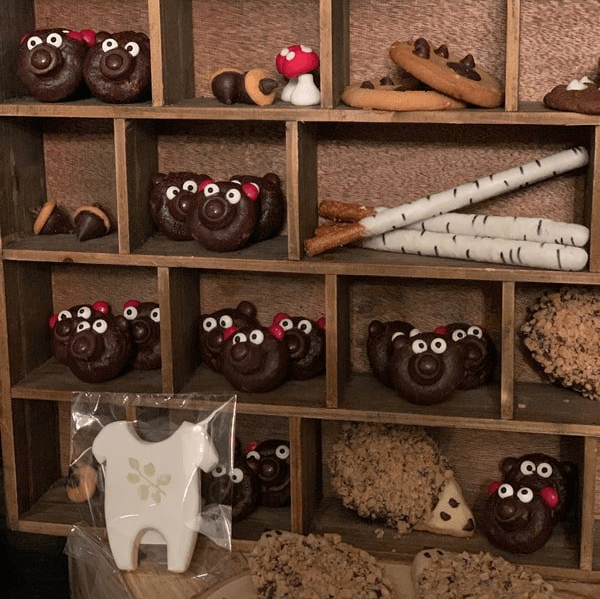 A shelf filled with a variety of chocolate animals