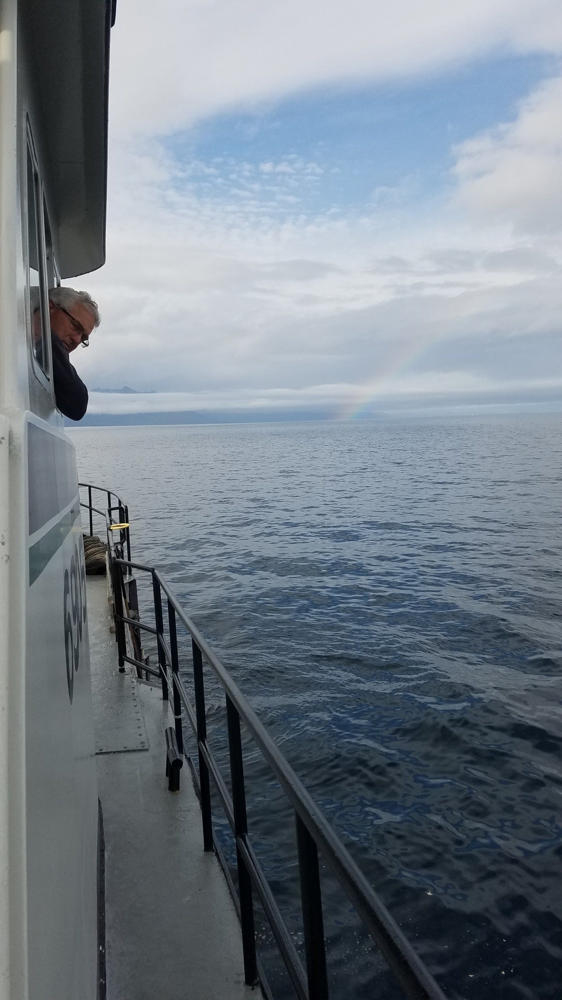 jim hubbard looking out fishing boat window