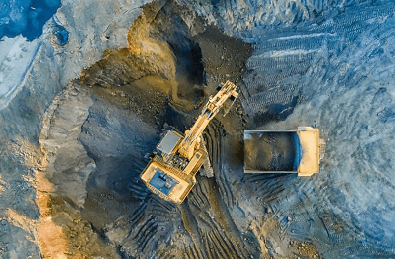 Aerial view of trucks working at mine