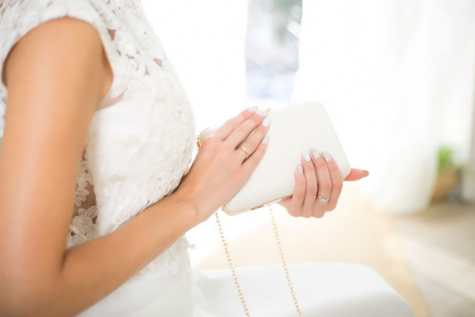 Handtasche oder Clutch
