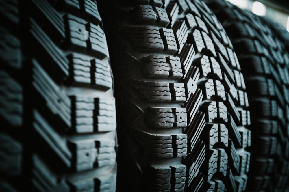 Close-up of Three Stacked Car Tyres