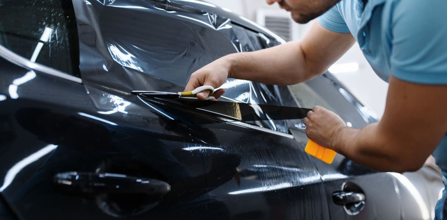 Close-up of ceramic car tint installation