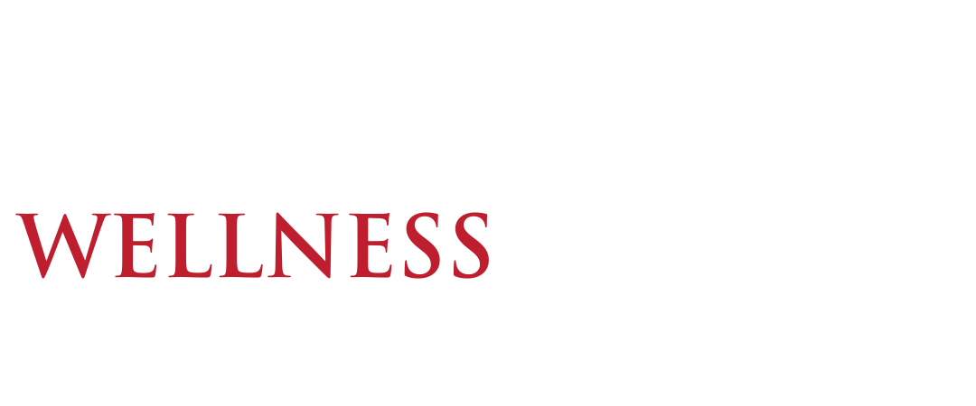 The word wellness is written in red on a white background.