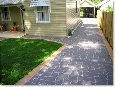 gray concrete tile driveway