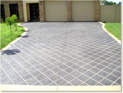 gray concrete tile driveway