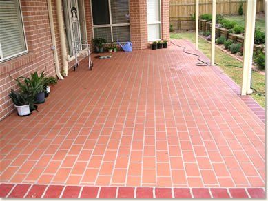 red concrete tile driveway