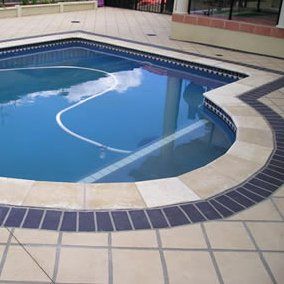 pool with tile surrounds