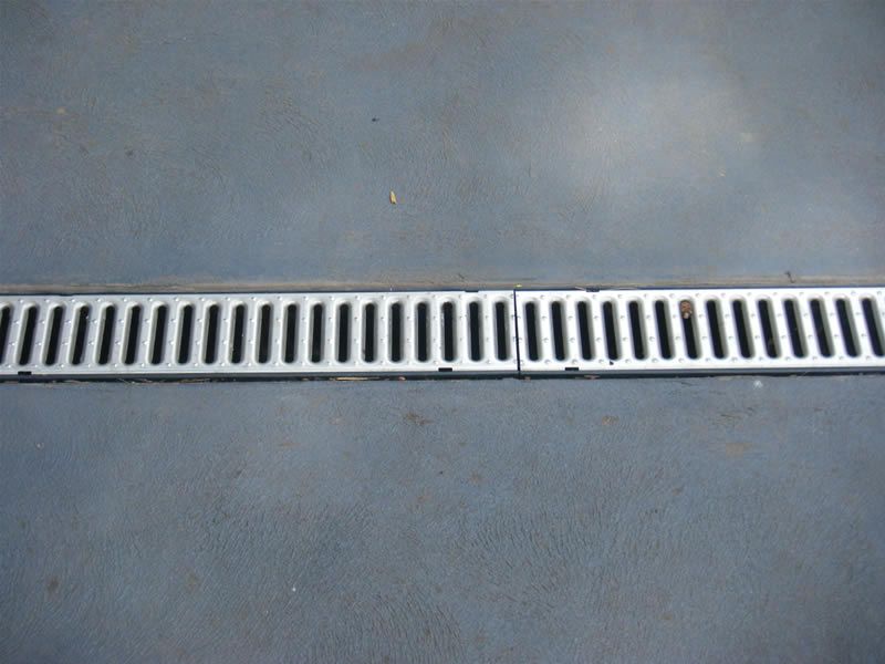 drain in a concrete driveway