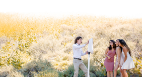 Salsa Stand is being used outdoors with a small group