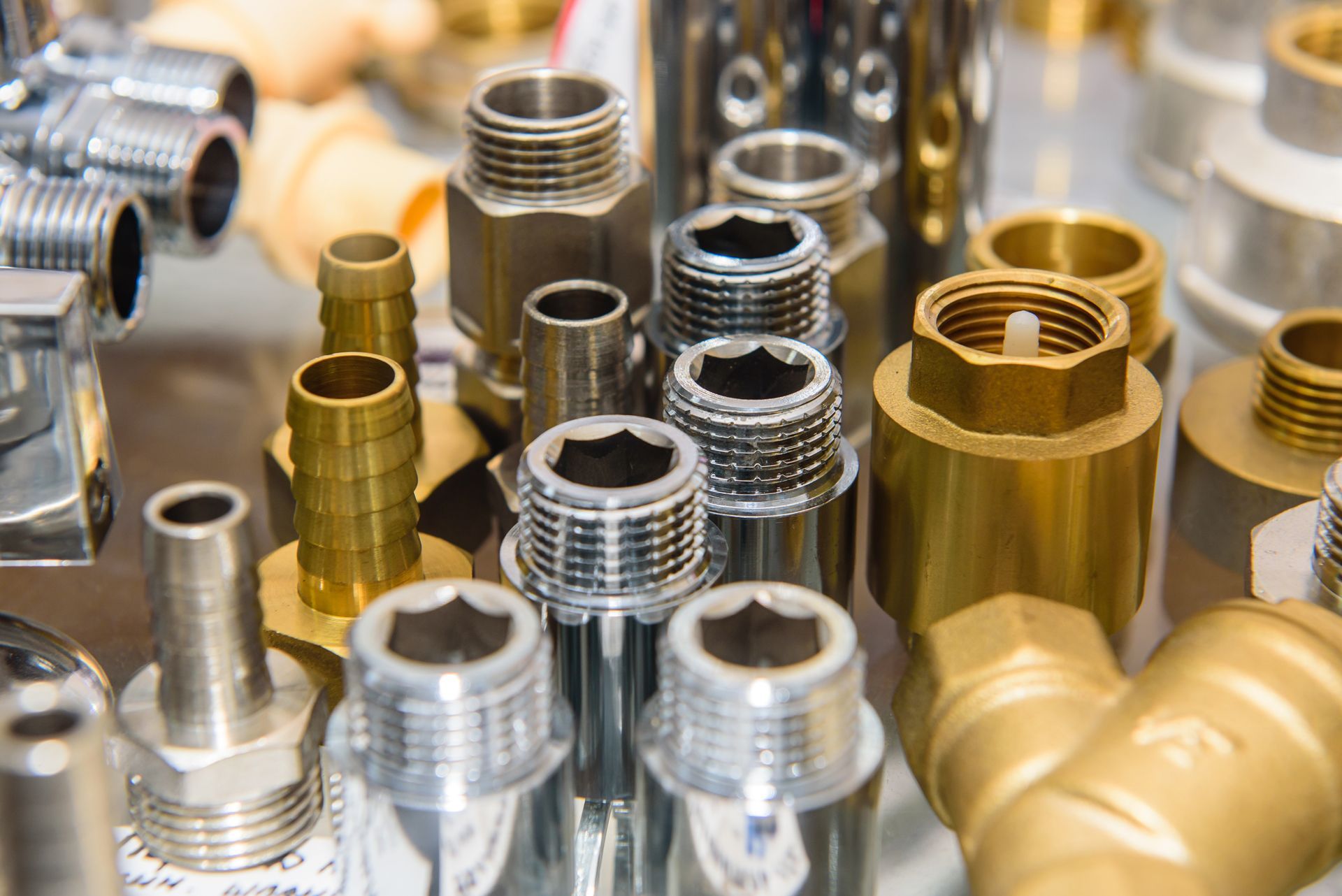 Different types of metal fittings on the table