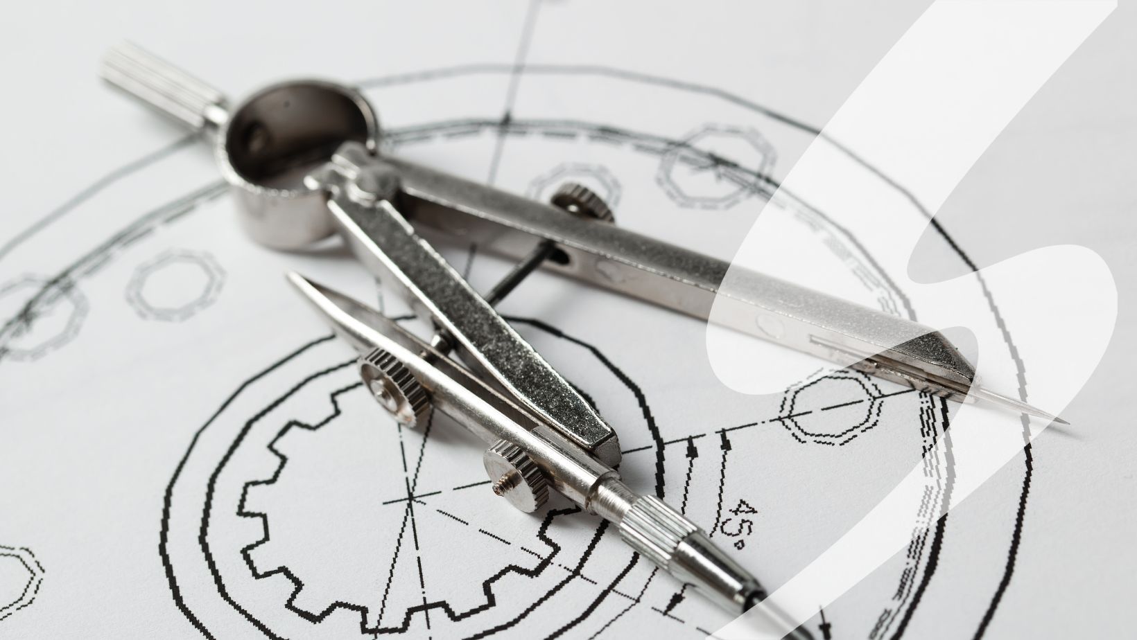 A compass over a mechanical drawing