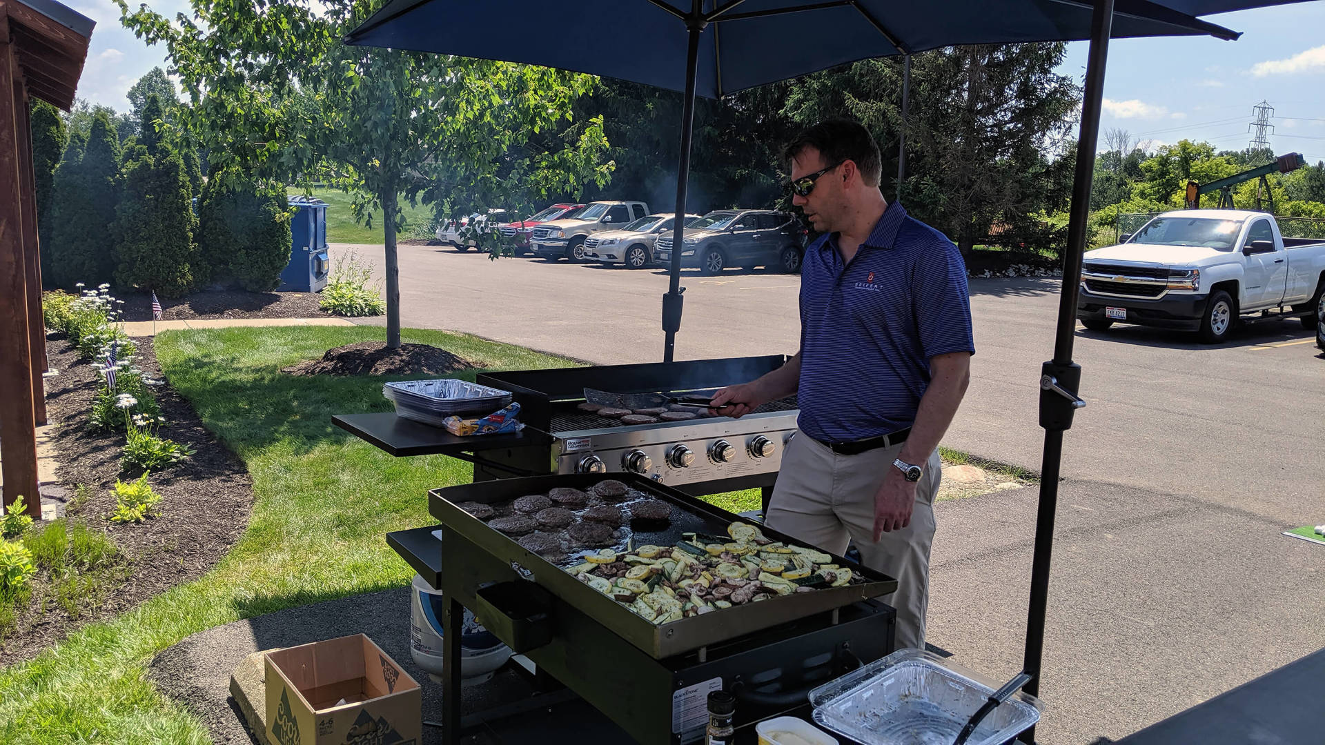 An employee at the grill
