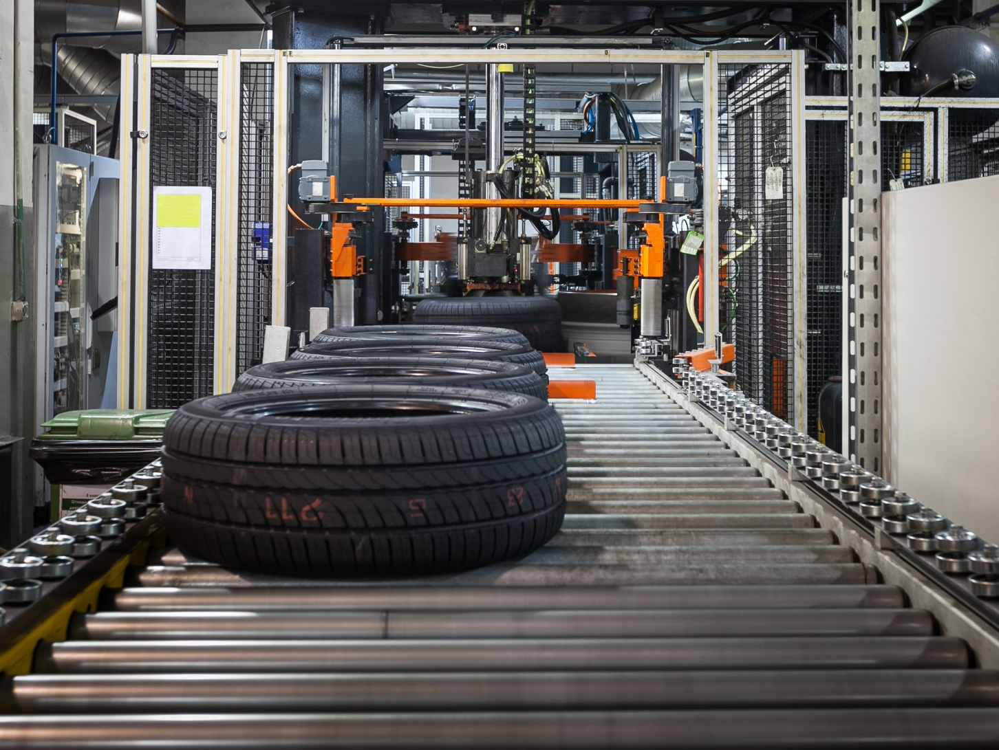 Tires on a conveyor.