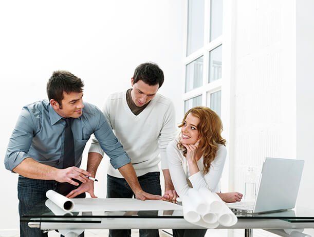 Technical staffing professionals around a table