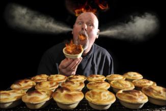 Ron Bruns Eating Hottest Pie — Pies & Pastries in Umina Beach, NSW