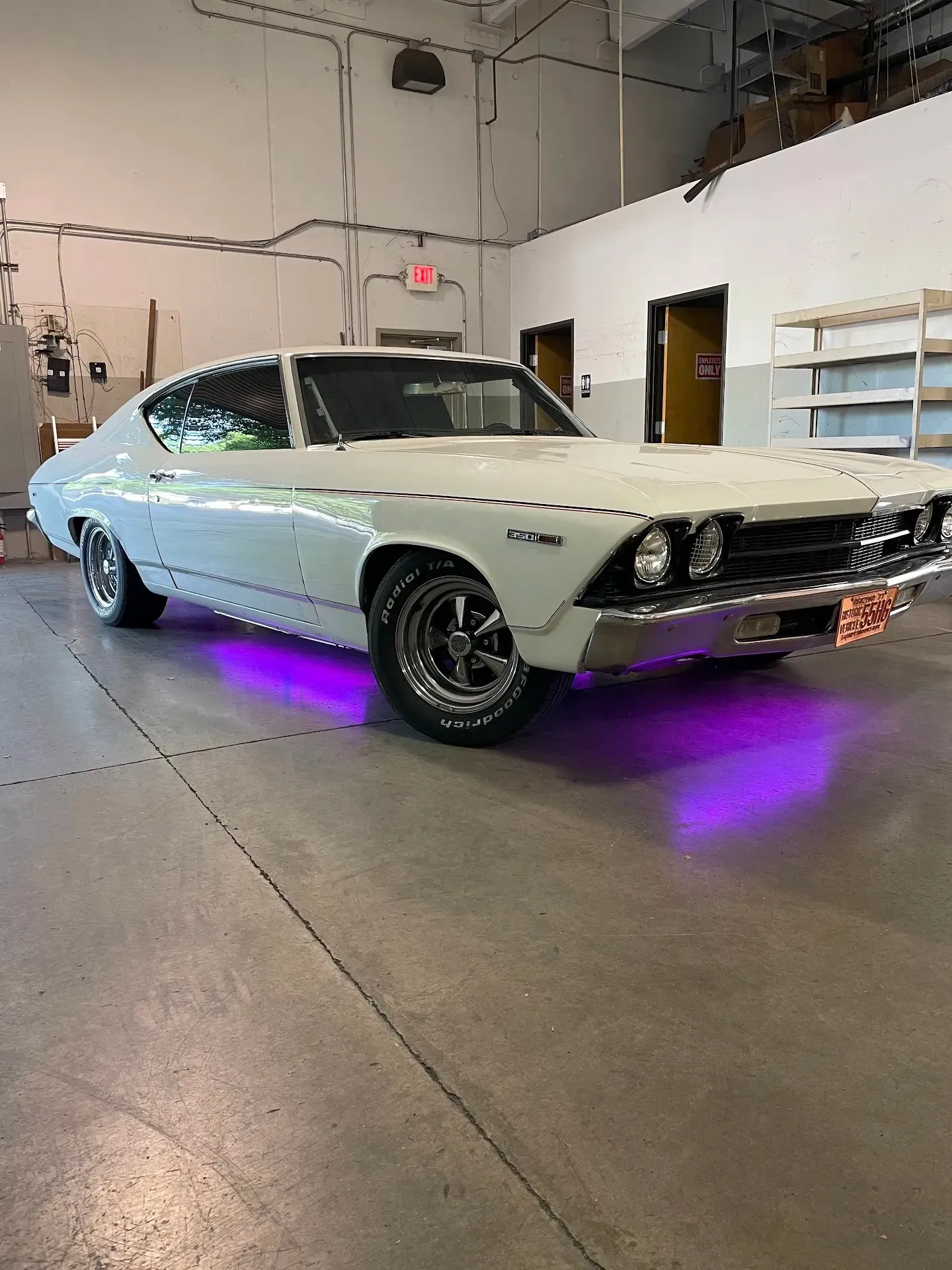 White Classic Muscle Car with Purple Underglow | Wade's Automotive & Exhaust