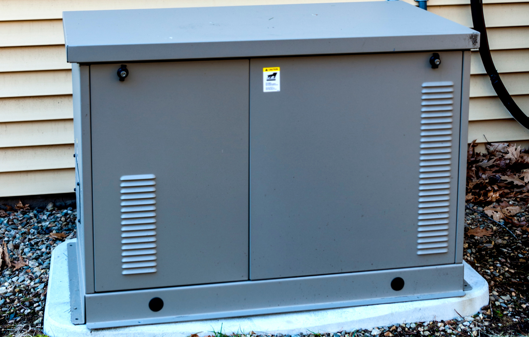 A gray box with a caution sign on it