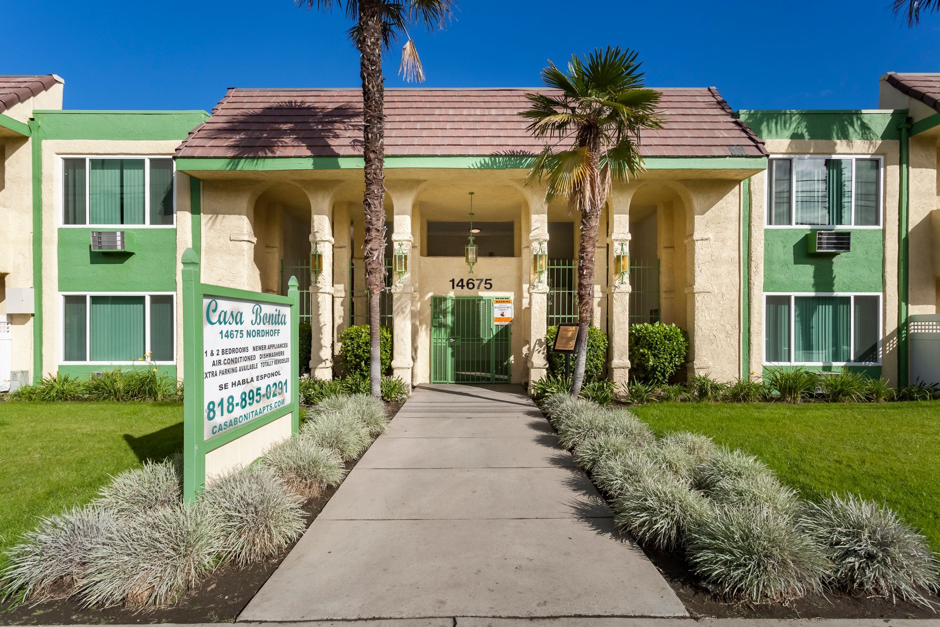 A building with a sign in front of it that says los angeles homes